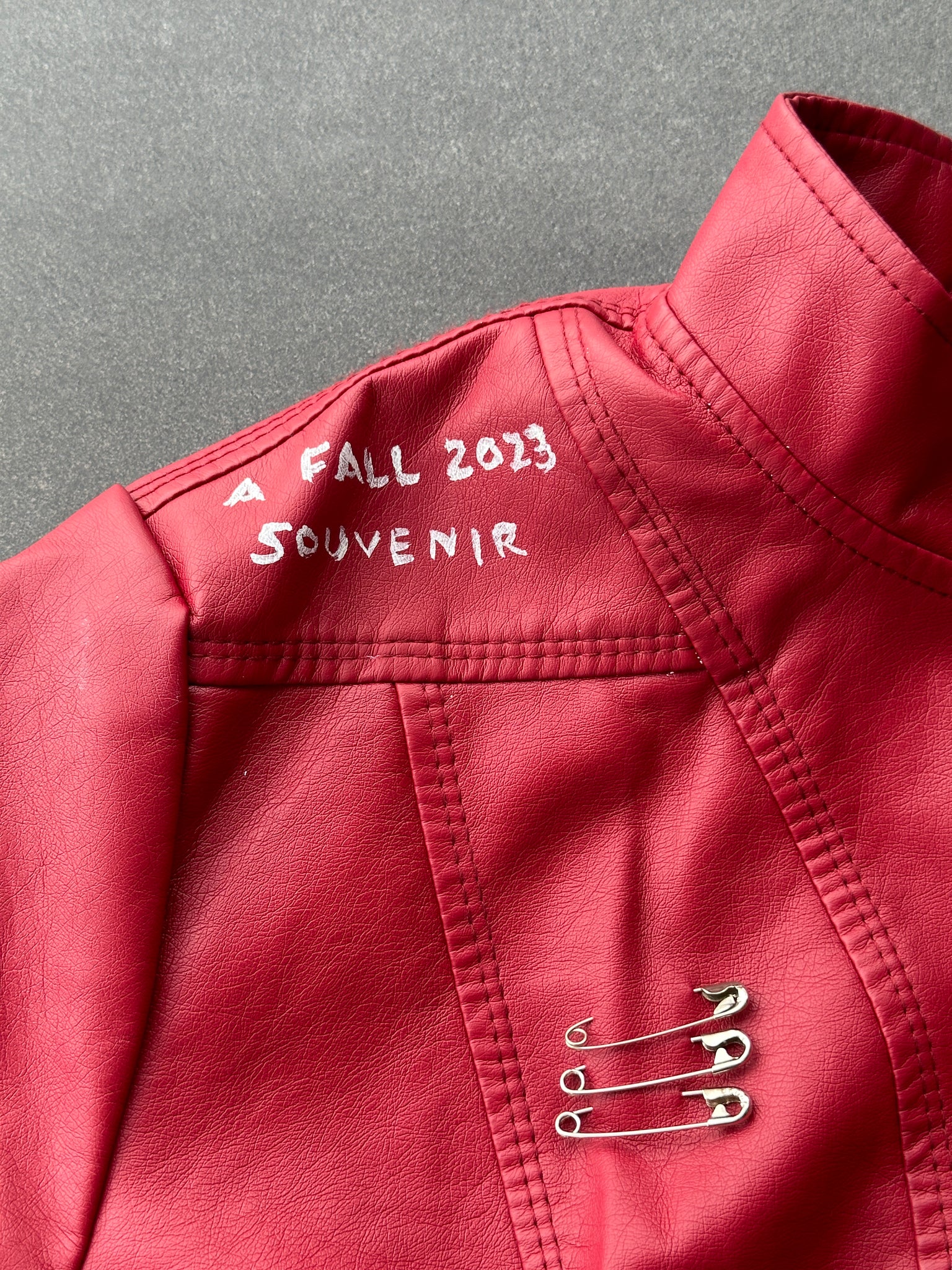 "Pop of Red – A Fall 2023 Souvenir" Faux Leather Jacket